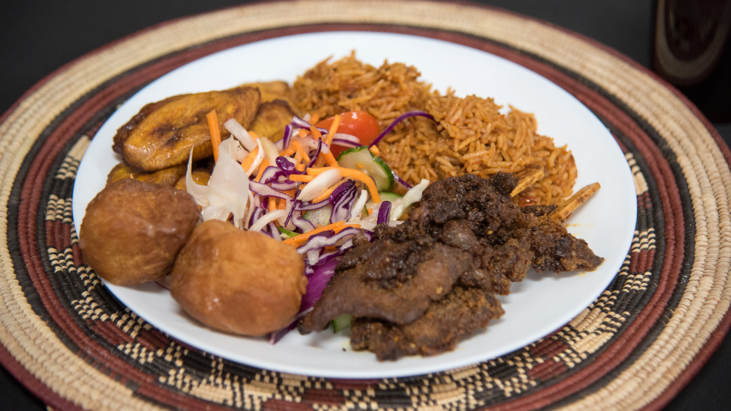 A plate of cultural food prepared by Yaya's Kitchen