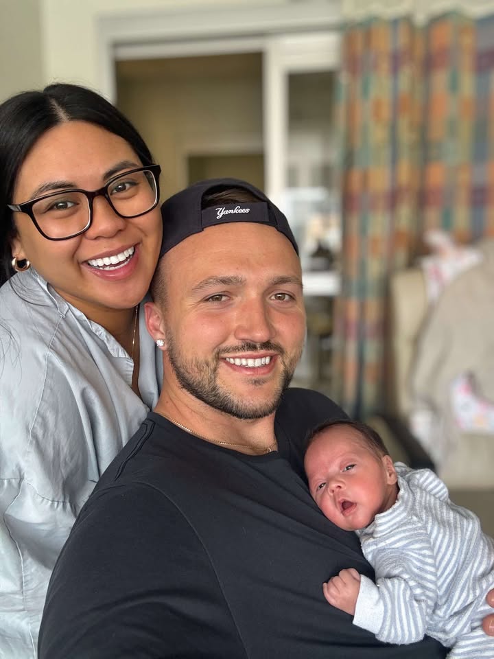 Emily, Austin and Ivy spooner in their hospital room