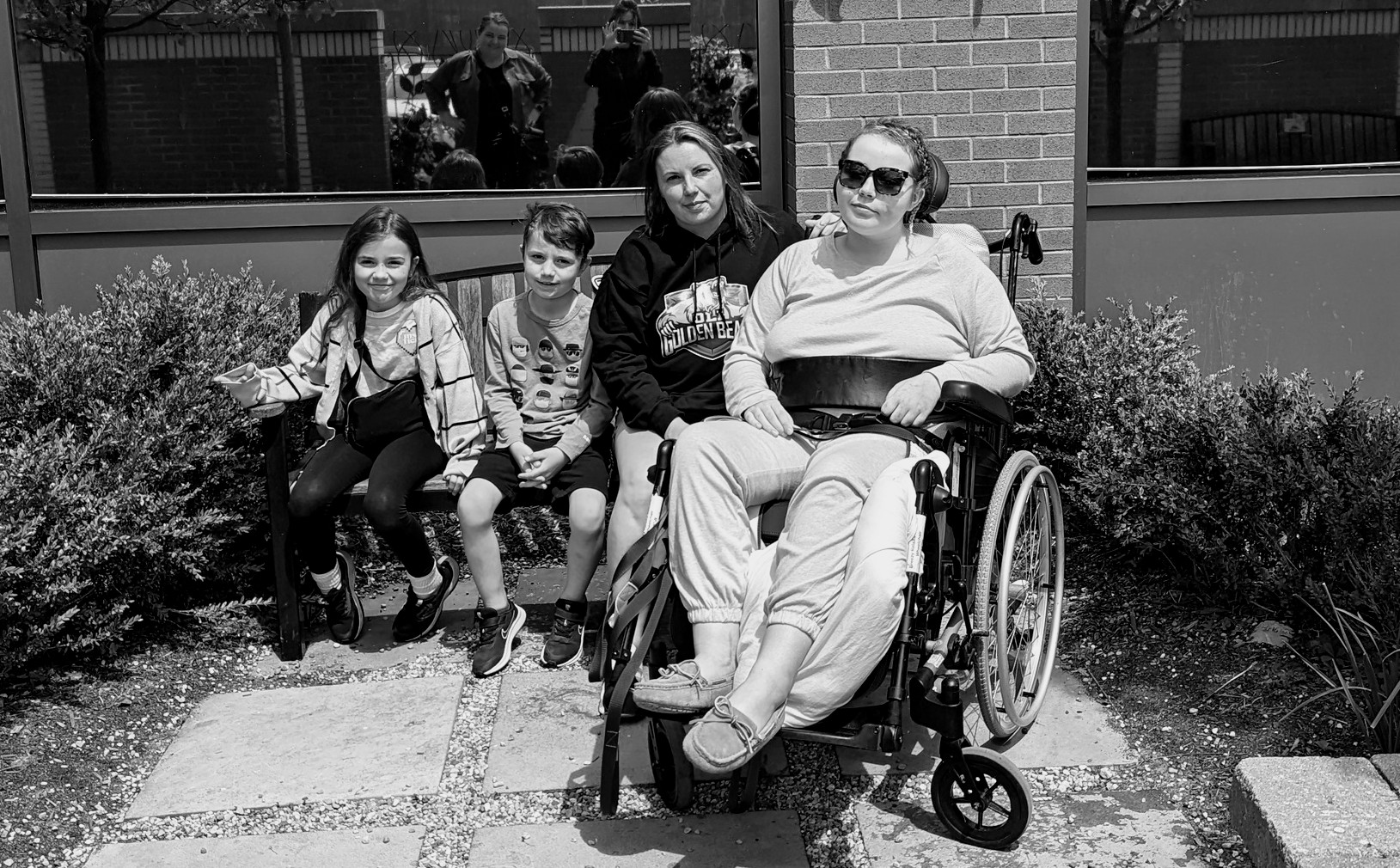 Layla with her mother and siblings outside of Children's Hospital.