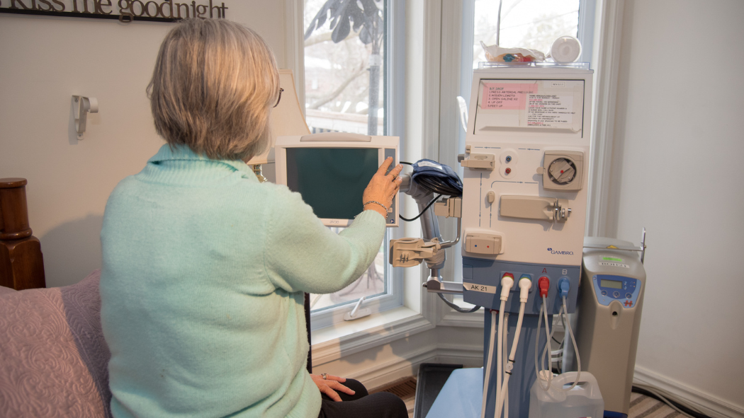 Bonnie using her home hemodialysis machine