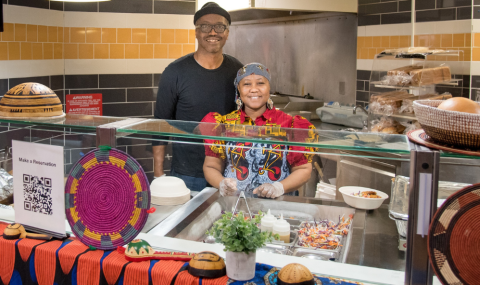 Maryem and Melvin Wright from Yaya’s Kitchen stand behind the serving counter at LHSC Victoria Hospital's Faye's Café.