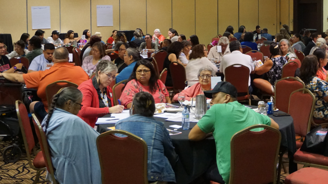 Attendees of the 2023 Indigenous Voices Matter Community Engagement Session participate in breakout group discussions.